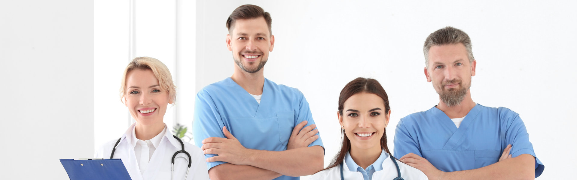 doctor and nurse smiling